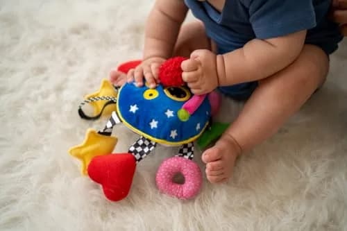 Manhattan Toy Baby Whoozit 6" Stroller and Travel Activity Toy | Multicolor Animal Toy for Babies thumbnail 2