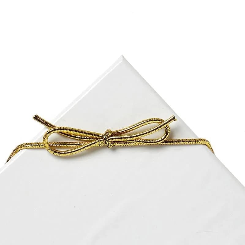 Paper Mart Gold Decorative Ribbon Trim 8" | Elegant Gift Wrapping Accessory - main product image