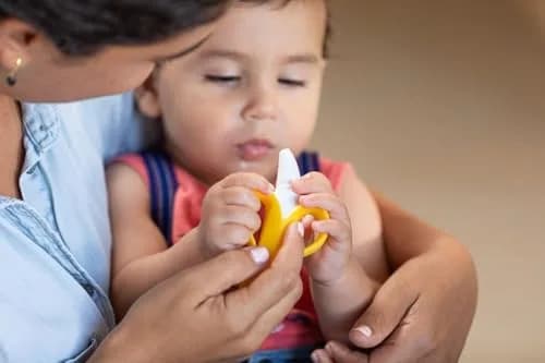 Nuby NanaNubs Banana Massaging Teether 3+ Months | Soft Silicone Gum Massager thumbnail 2
