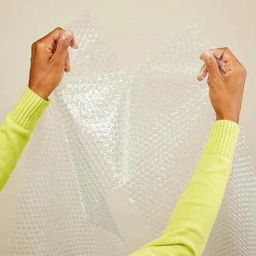Amazon Basics Perforated Bubble Wrap Roll 30.48 cm x 53.34 m | Small 3/16" Bubbles, Clear thumbnail 4