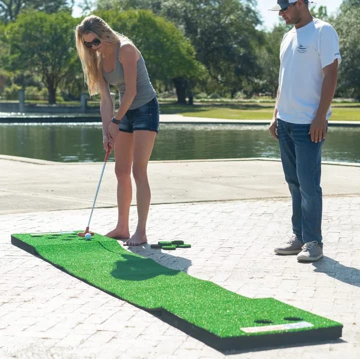 PutterBall Original Golf Putting Game Set – Backyard 12 ft Putting Green Pong Style Golf Mat with 2 Putters, 2 Balls & Hole Covers thumbnail 6