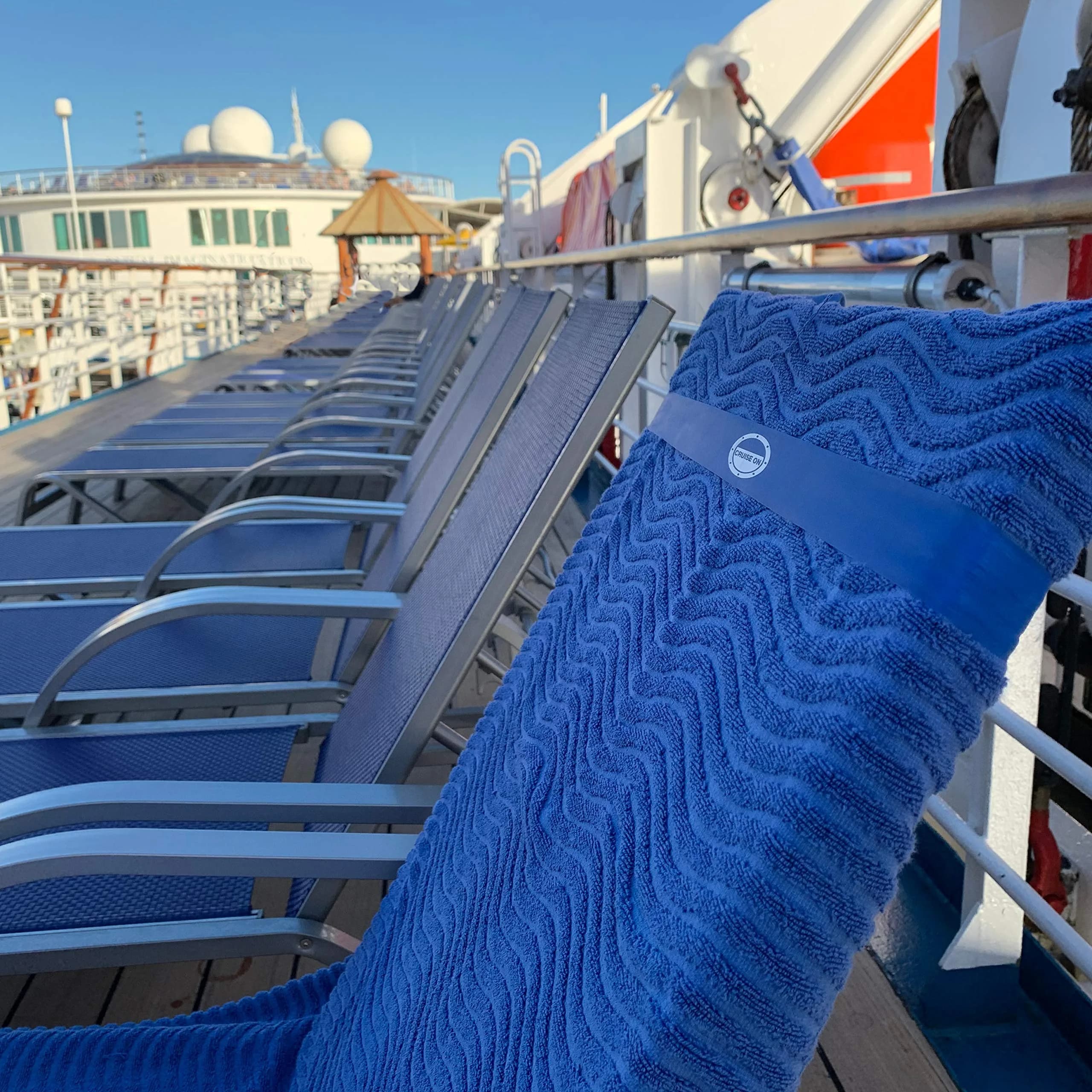 Cruise On Towel Bands for Cruise Chairs, 4 Pack, Blue | Flexible Latex Towel Holders for Beach & Pool thumbnail 4