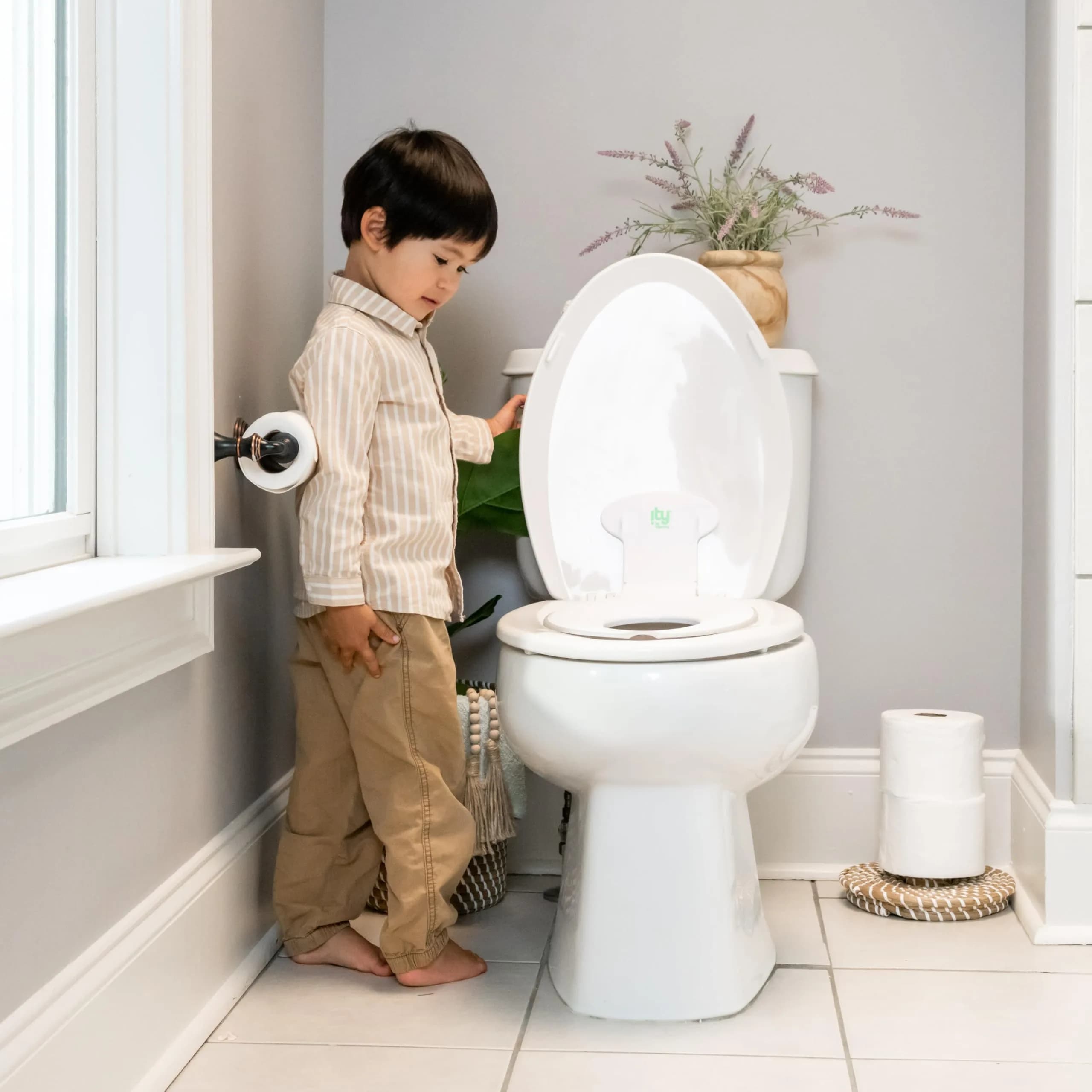 Ingenuity Flip & Sit Potty Seat White | Attaches to Adult Toilet Seat, 18 Months+ - view 8