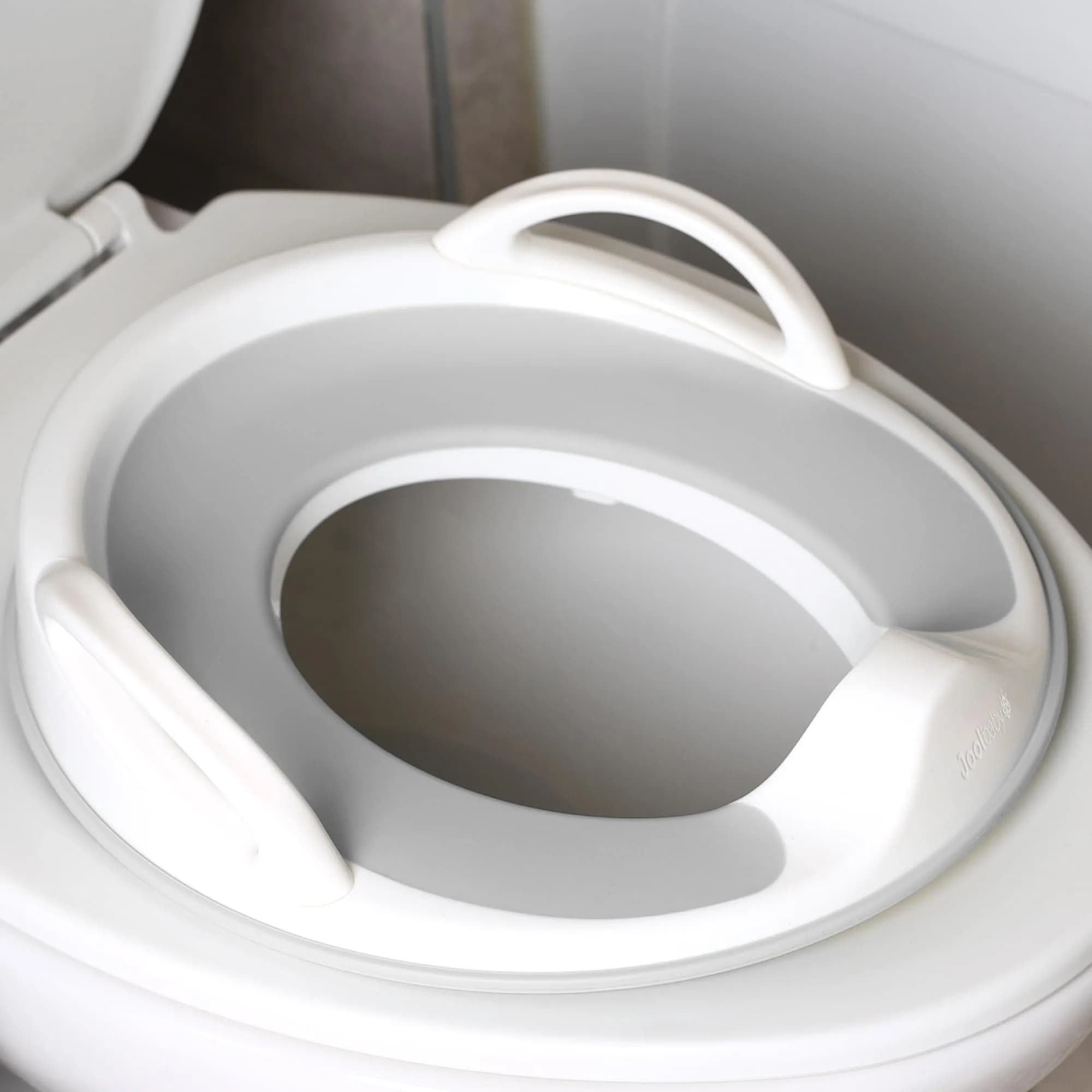 Jool Baby Potty Training Seat for Boys and Girls With Handles, Fits Round & Oval Toilets, Non-Slip with Splash Guard (Gray)