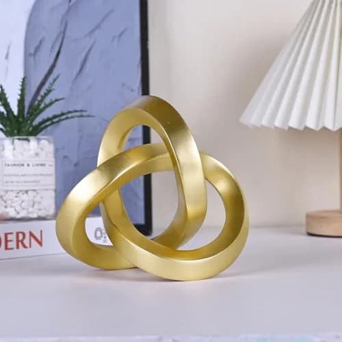 DOVDOV Gold Knot Decorative Sculpture 3.9 inches | Modern Art Mobius Ring for Shelves & Office thumbnail 6