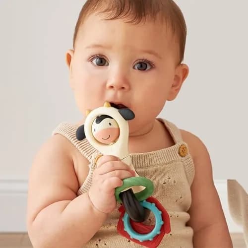Itzy Ritzy Spinner Rattle Teether Cow | Ages 3 Months+ thumbnail 2