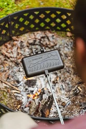 Coghlan's Double Cast Iron Camp Cooker – Pre-Seasoned Double Pie Iron for Campfire Cooking, Makes 2 Camping Pies at Once, Removable Handles, Wooden Grips & Cleaning Scrubber thumbnail 2