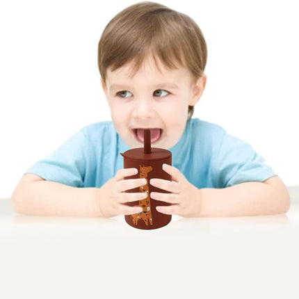Kid drinking from Silicone Straw Cup