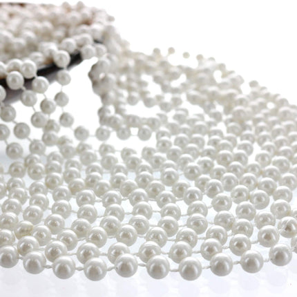 Buy GIFTEXPRESSR 12 PCS Faux White Pearl Bead Necklaces Flapper Beads Party Accessory Party Favor in India.