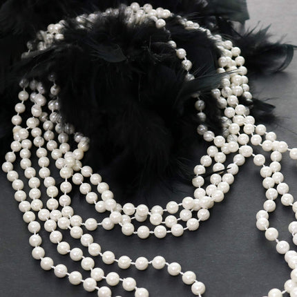 Buy GIFTEXPRESSR 12 PCS Faux White Pearl Bead Necklaces Flapper Beads Party Accessory Party Favor in India.