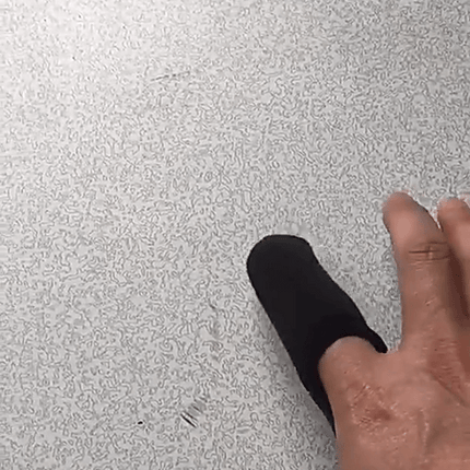 Person using Magnetic Fingertip Sleeve 